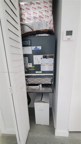 a view of storage and utility room