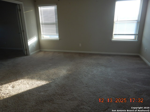3206 Junction Bay Converse, TX 78109 - Photo 13 of 20 an empty room with windows