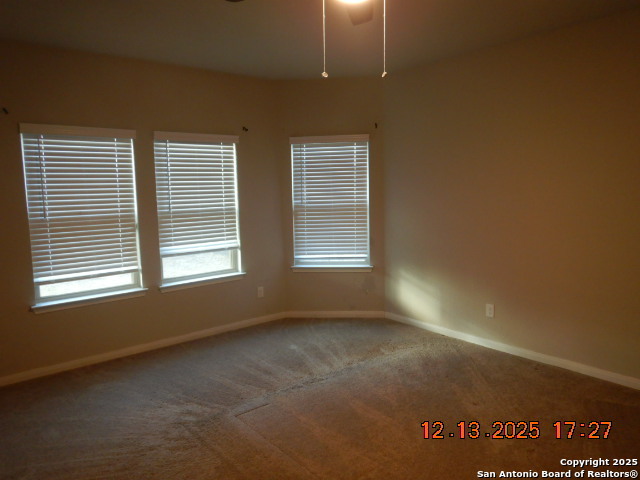 3206 Junction Bay Converse, TX 78109 - Photo 7 of 20 a view of an empty room with a window