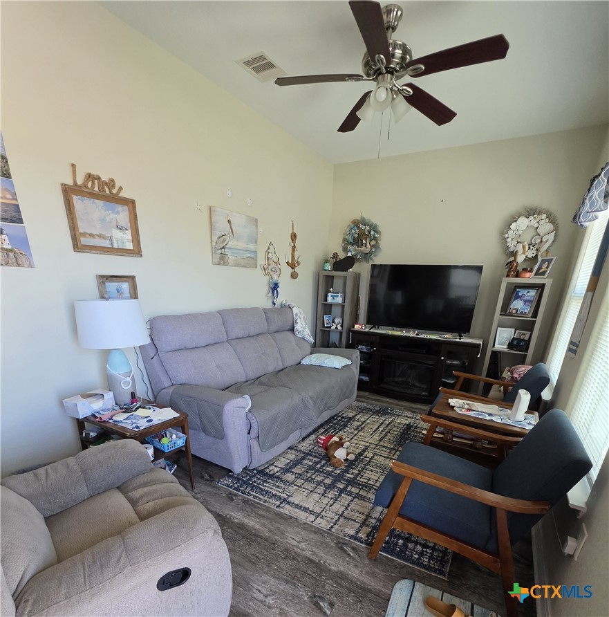501 13th Street Seadrift, TX 77983 - Photo 14 of 22 a living room with furniture and a flat screen tv