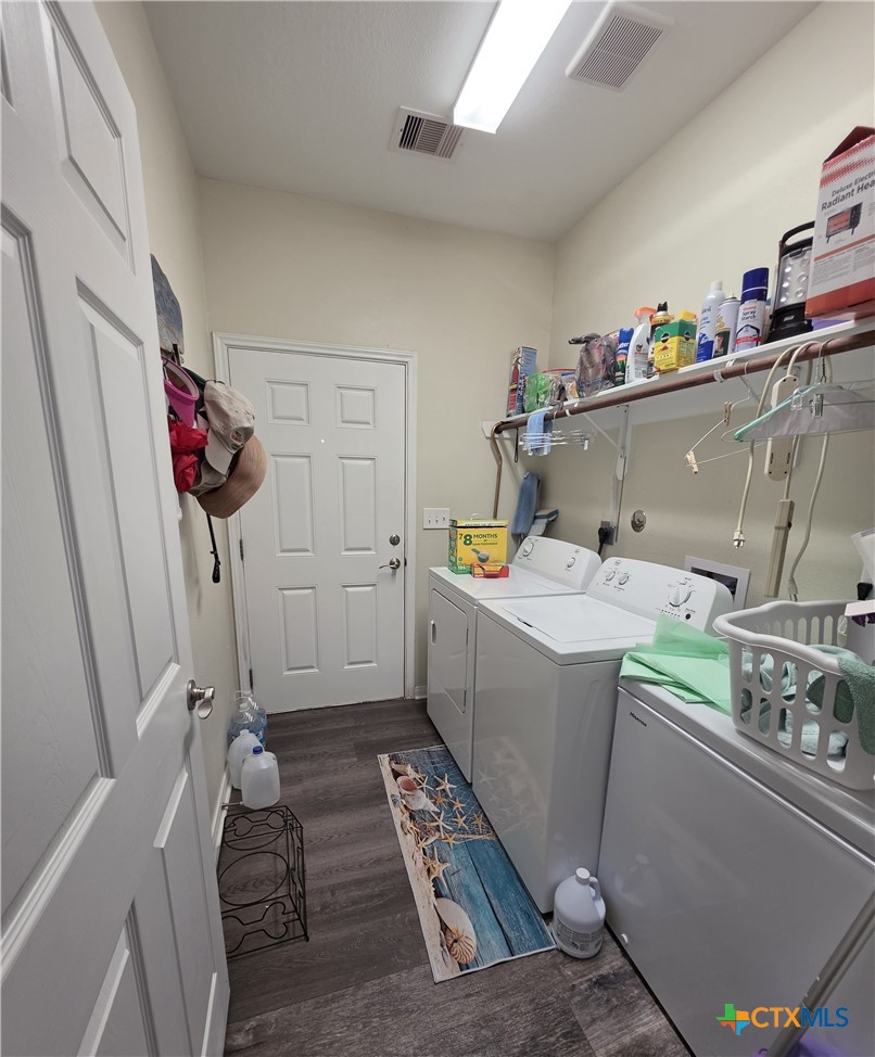501 13th Street Seadrift, TX 77983 - Photo 17 of 22 a room with storage and utility