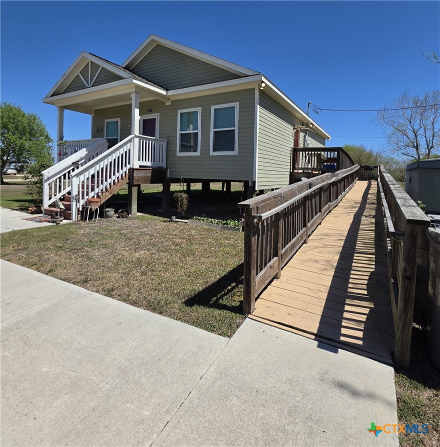 501 13th Street Seadrift, TX 77983 - Photo 2 of 22 a view of house along with deck and wooden floor