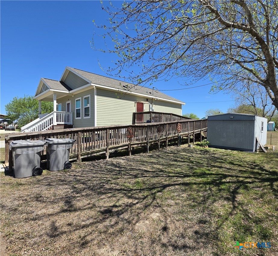 501 13th Street Seadrift, TX 77983 - Photo 3 of 22 a house with trees in front of it