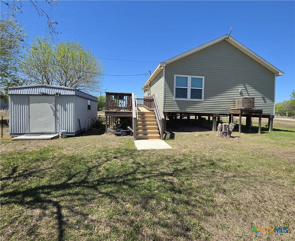 501 13th Street Seadrift, TX 77983 - Photo 5 of 22 a front view of a house with a yard
