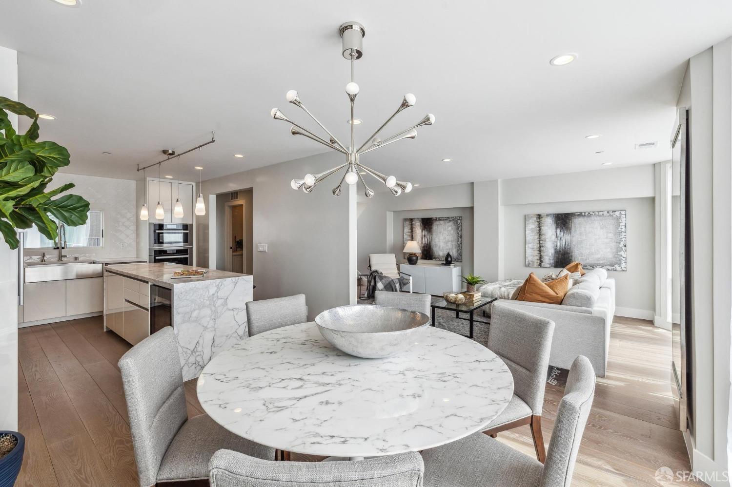340 25th Avenue San Francisco, CA 94121 - Photo 19 of 73 a living room with furniture kitchen and a chandelier