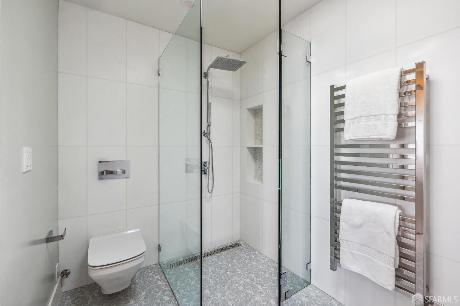 340 25th Avenue San Francisco, CA 94121 - Photo 27 of 73 a bathroom with a toilet and a shower