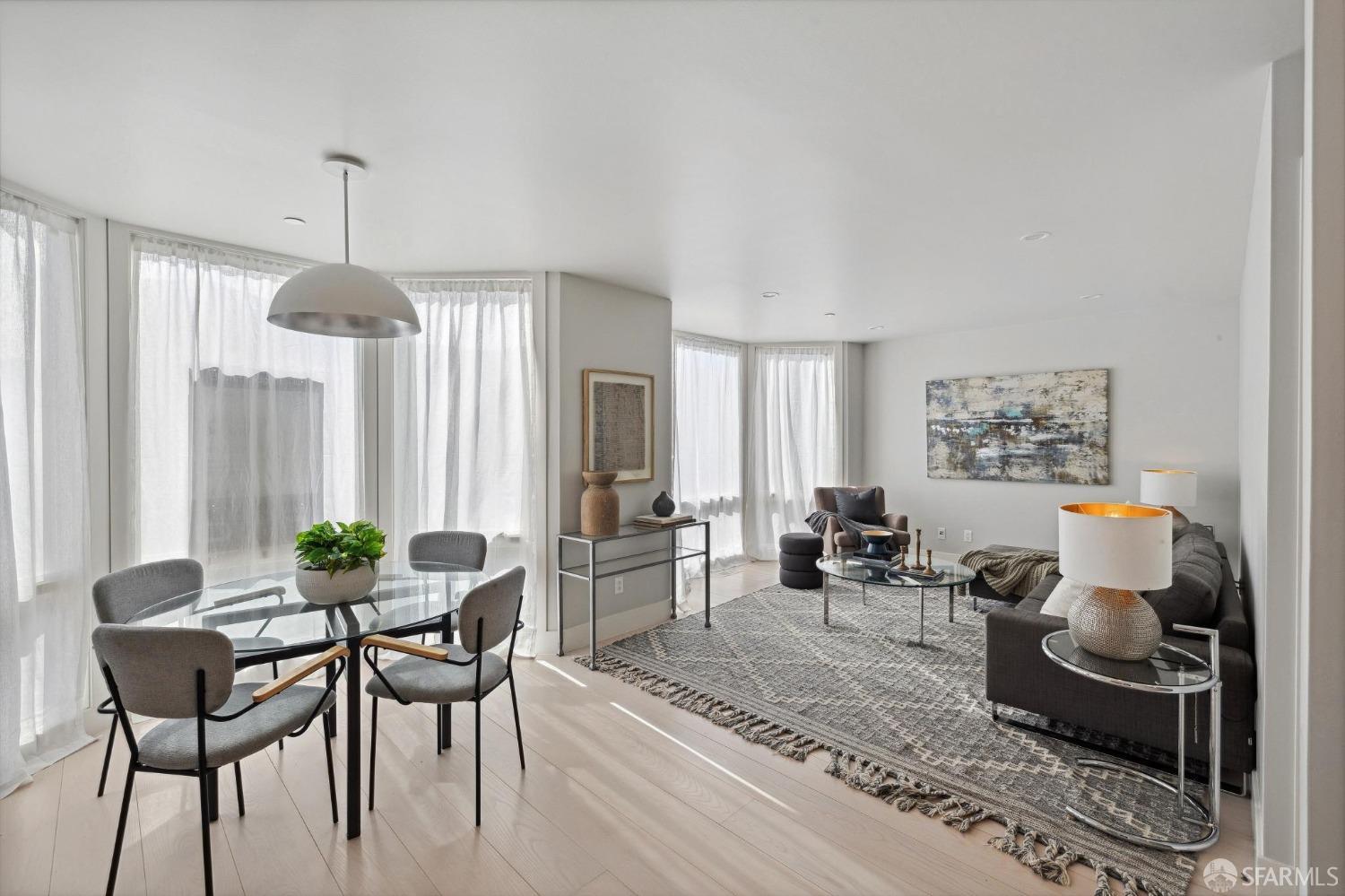 340 25th Avenue San Francisco, CA 94121 - Photo 47 of 73 a living room with furniture and a chandelier