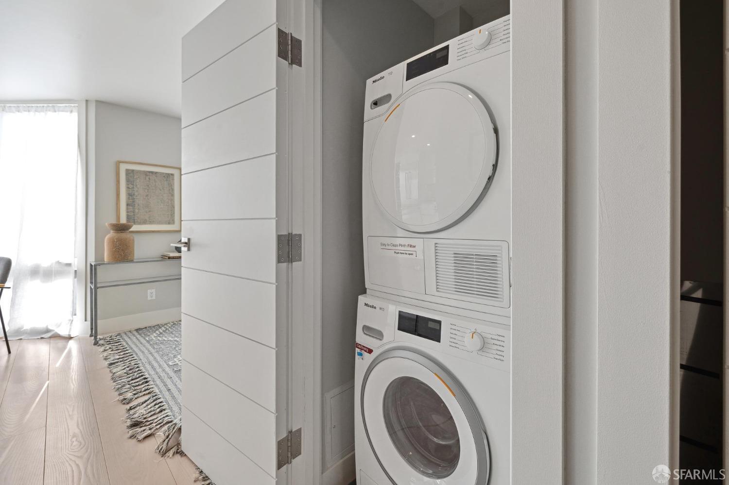 340 25th Avenue San Francisco, CA 94121 - Photo 51 of 73 a view of a hallway with washer and dryer