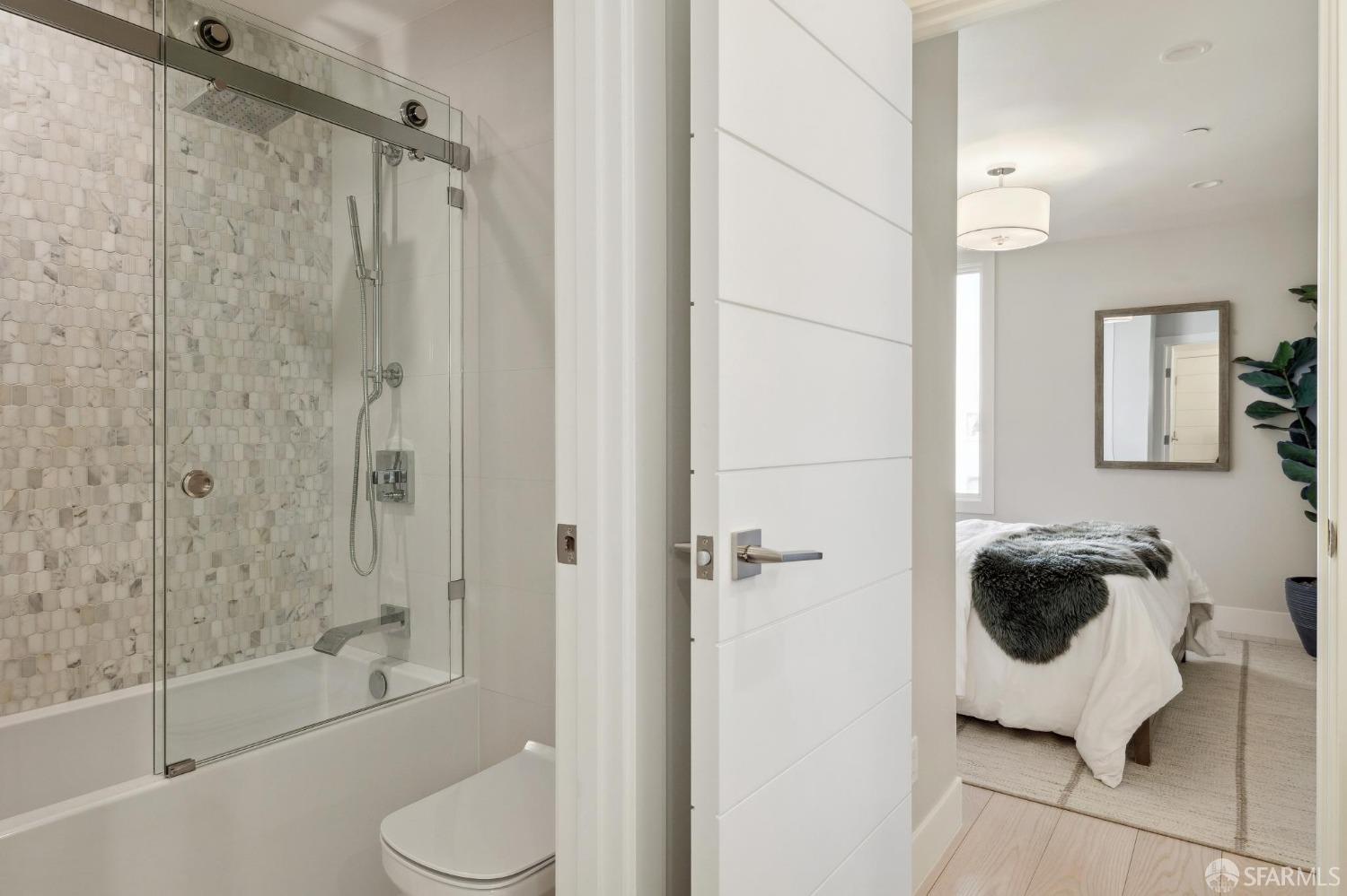 340 25th Avenue San Francisco, CA 94121 - Photo 60 of 73 a bathroom with a toilet a rug and shower