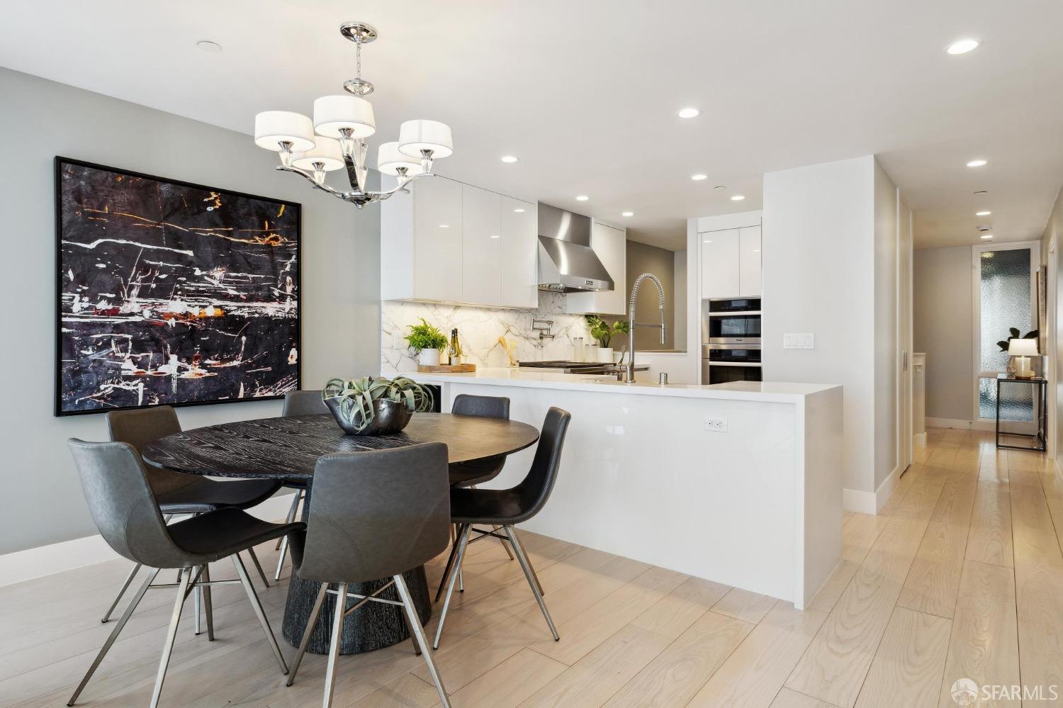 340 25th Avenue San Francisco, CA 94121 - Photo 66 of 73 a view of a dining room with furniture and wooden floor
