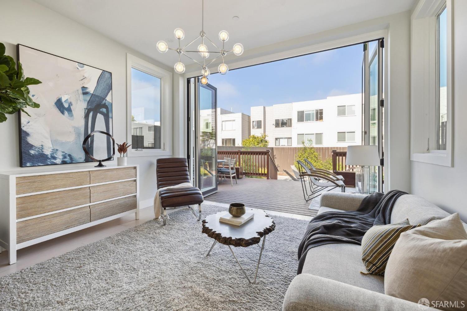 340 25th Avenue San Francisco, CA 94121 - Photo 69 of 73 a living room with furniture potted plant and a large window