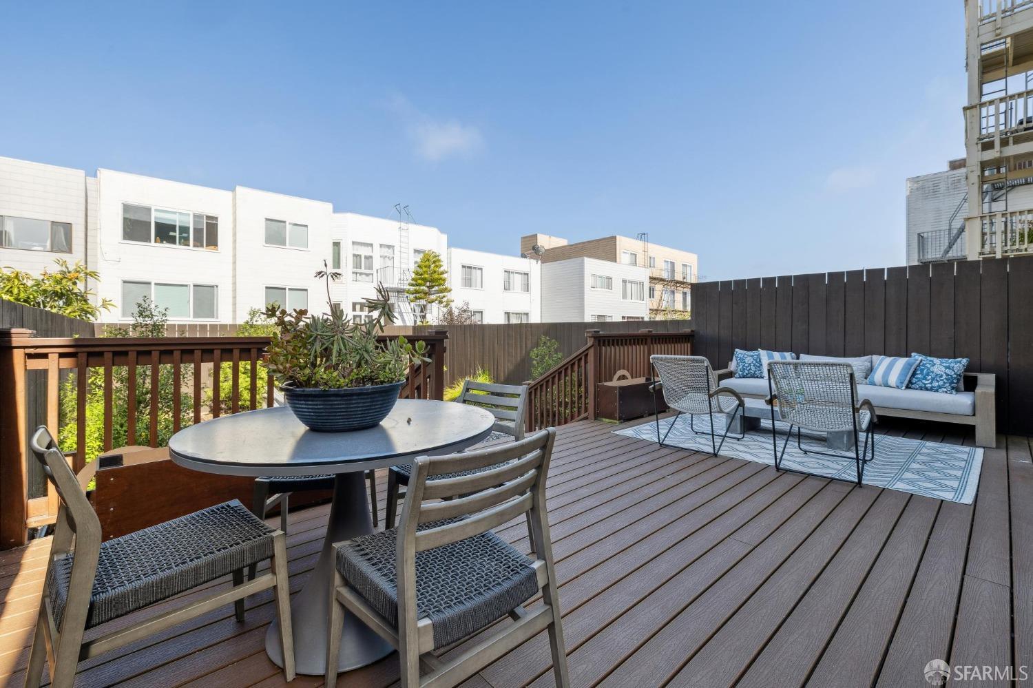 340 25th Avenue San Francisco, CA 94121 - Photo 70 of 73 a view of a roof deck with table and chairs