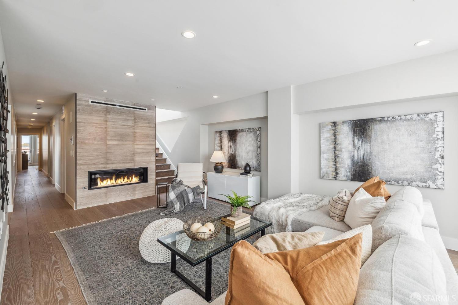 340 25th Avenue San Francisco, CA 94121 - Photo 8 of 73 a living room with furniture and a wooden floor