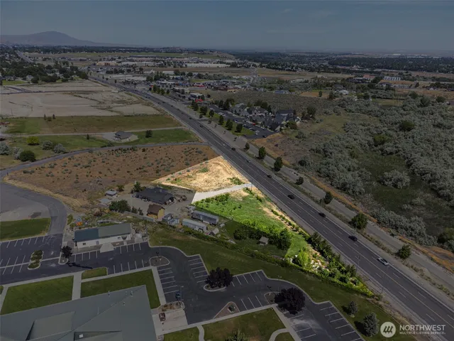 a view of a yard with wooden floor