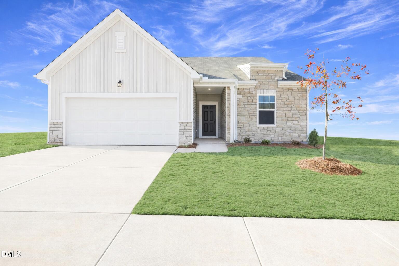 2573 Quarry Road Rolesville, NC 27571 - Photo 1 of 44 a view of a house with backyard and garden