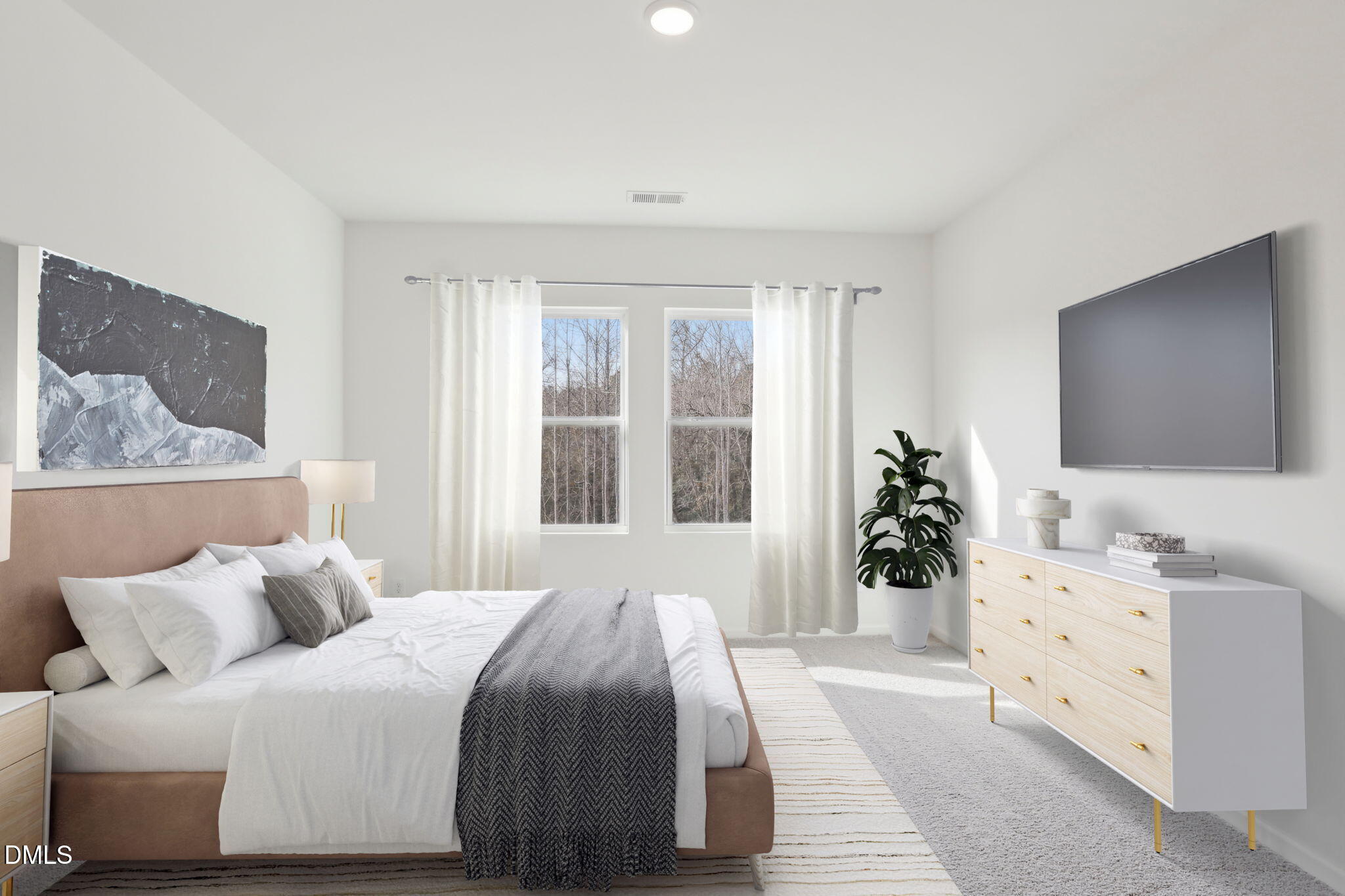 2573 Quarry Road Rolesville, NC 27571 - Photo 38 of 44 a bedroom with a bed and a flat screen tv