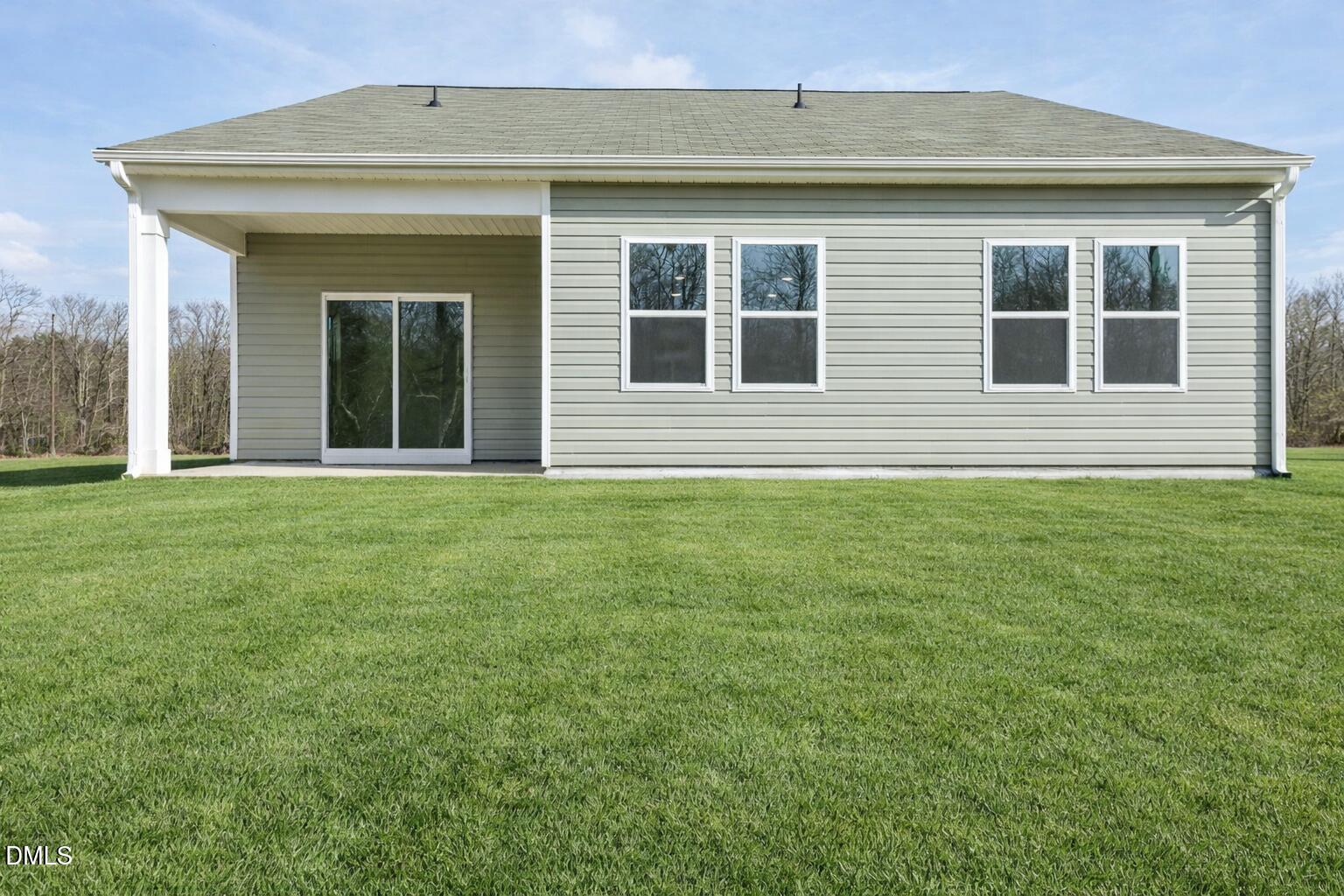 2573 Quarry Road Rolesville, NC 27571 - Photo 43 of 44 a front view of a house with a garden