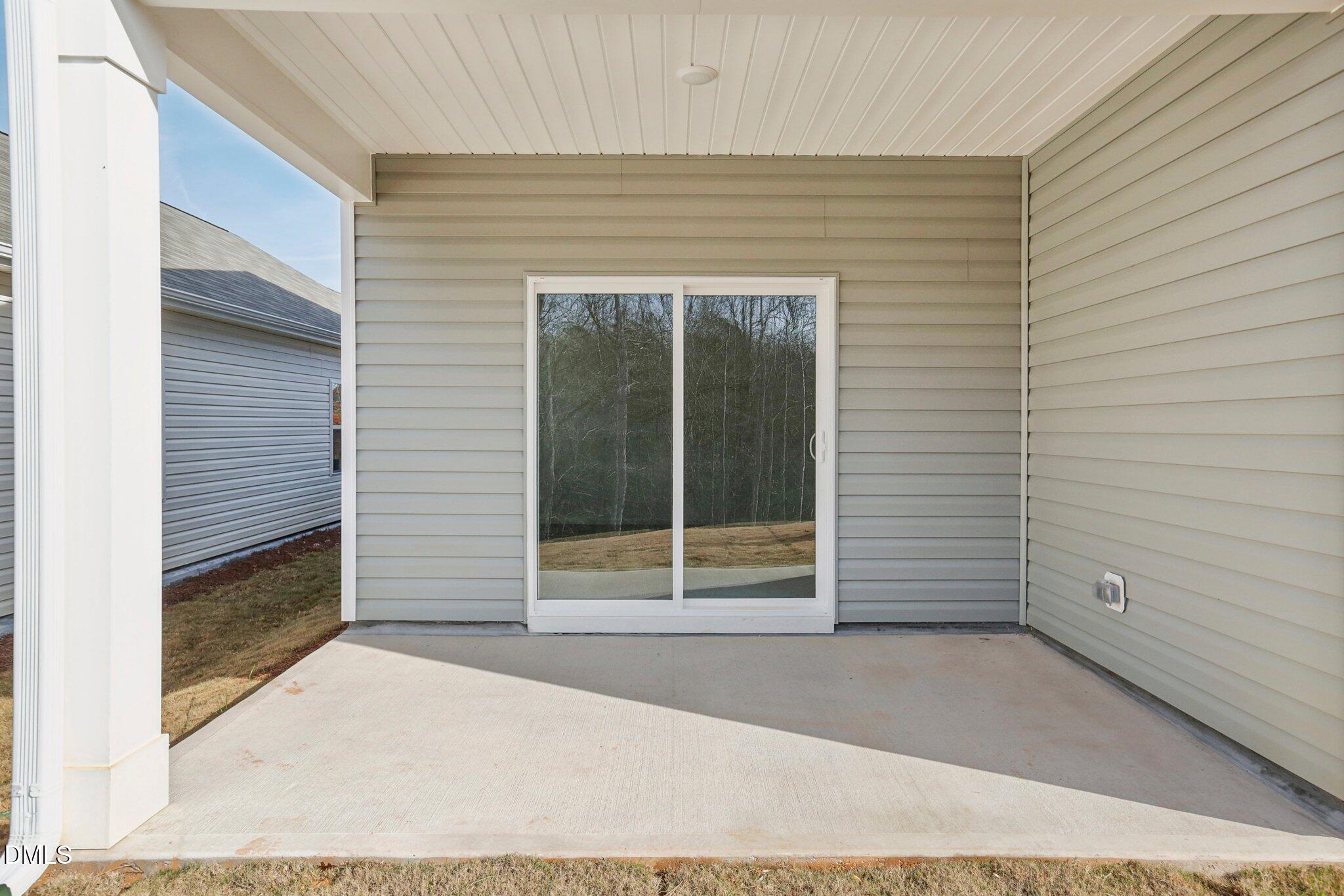 2573 Quarry Road Rolesville, NC 27571 - Photo 44 of 44 a view of a room with wooden floor and window