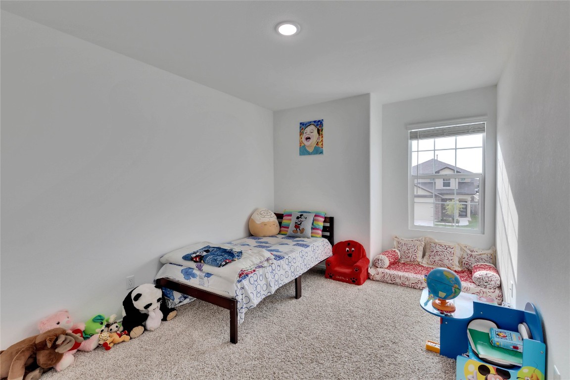124 Canley Loop Hutto, TX 78634 - Photo 14 of 19 Secondary bedroom