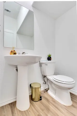 a bathroom with a sink and a toilet