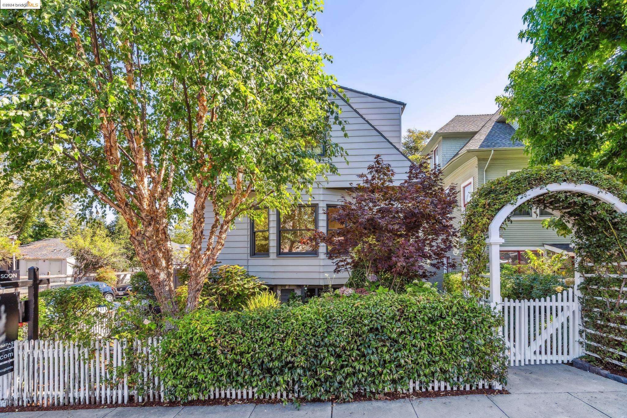 100 Echo Avenue Oakland, CA 94611 - Photo 1 of 1 front view of a house with a tree