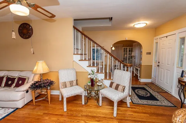 a view of a livingroom with furniture and a rug