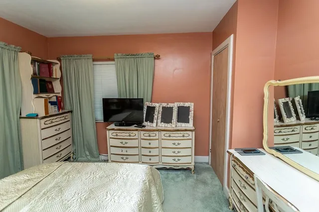 a view of an entryway with a hallway