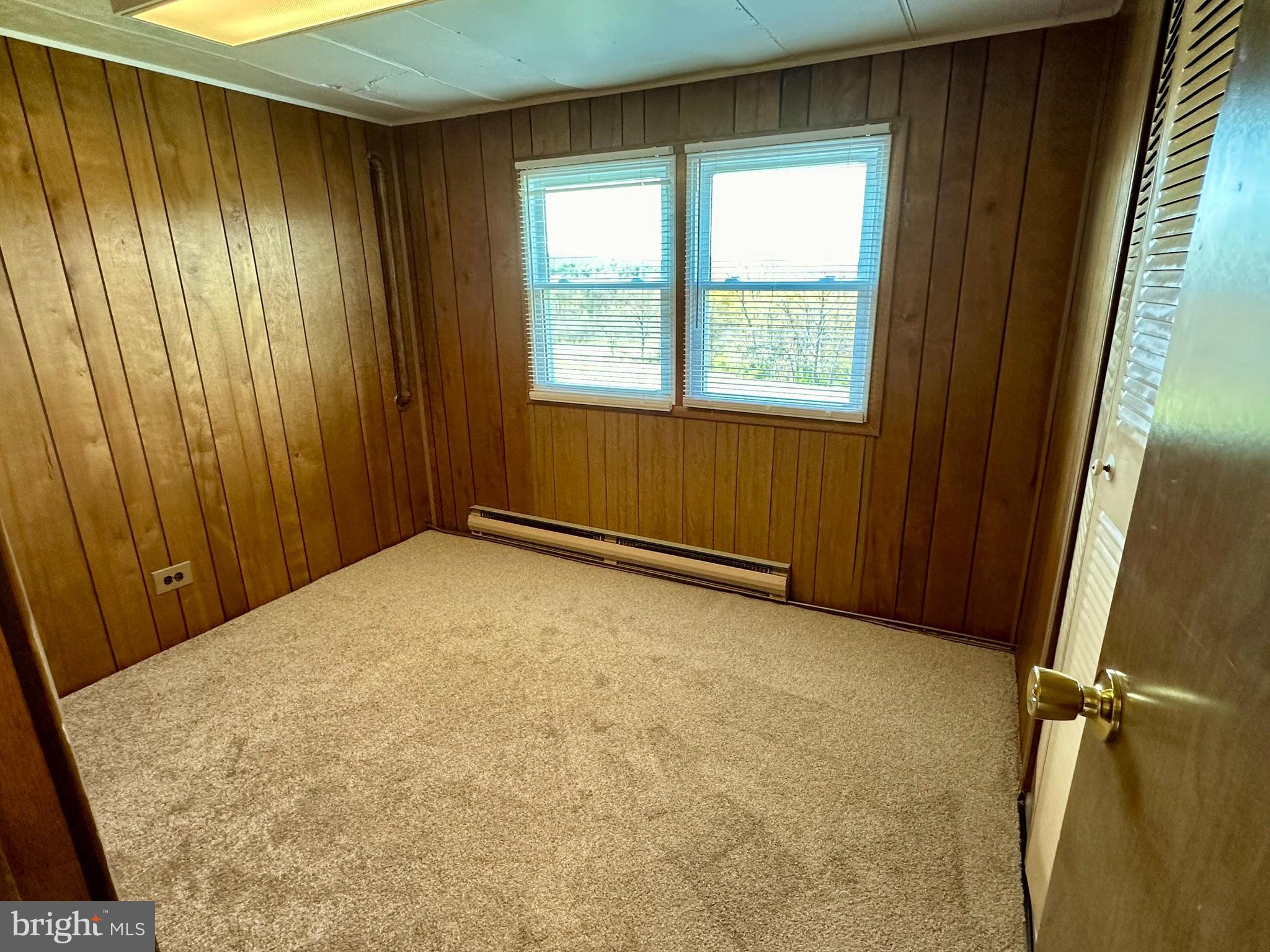 11449 A Alton Road Frederick, MD 21701 - Photo 11 of 25 a view of an empty room with a window