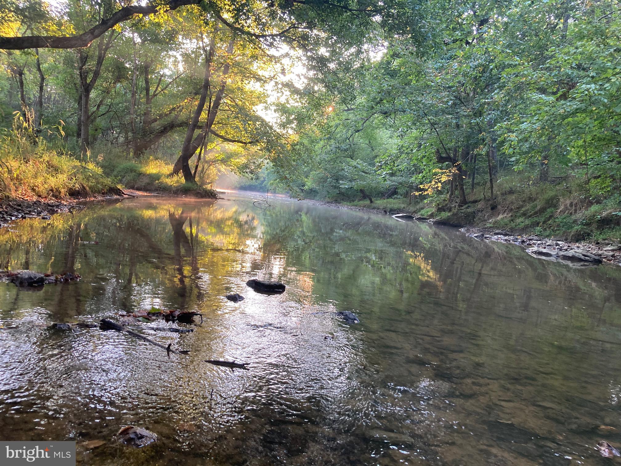 11449 A Alton Road Frederick, MD 21701 - Photo 18 of 25 a view of a lake with a yard