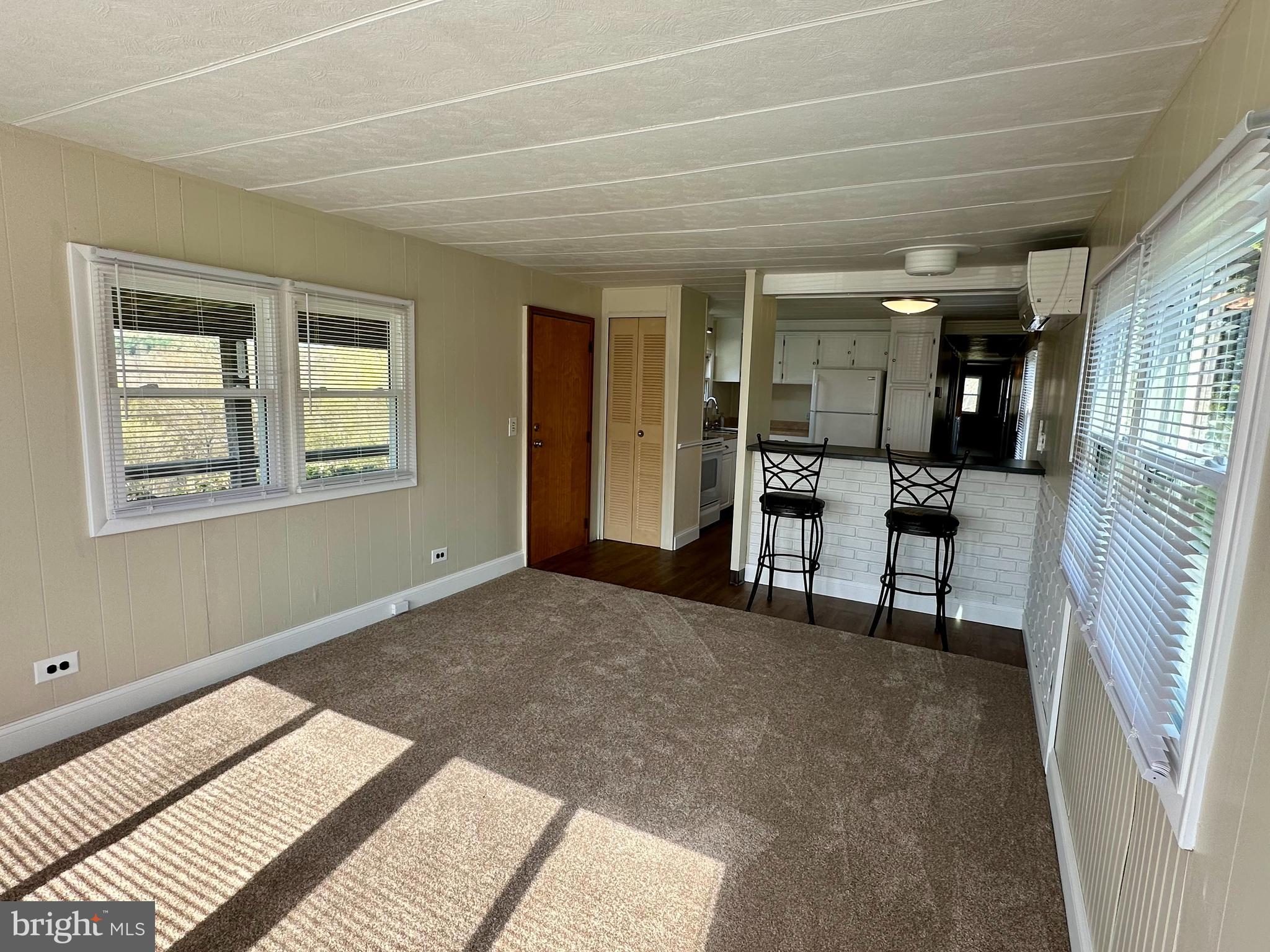 11449 A Alton Road Frederick, MD 21701 - Photo 4 of 25 a view of livingroom with furniture and window