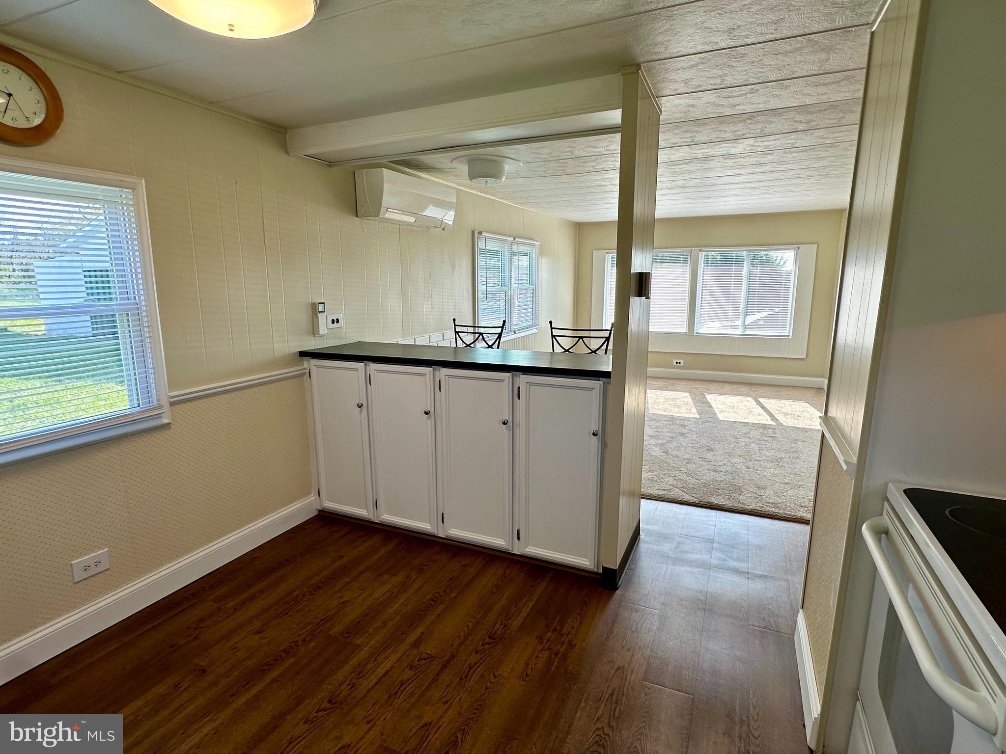 11449 A Alton Road Frederick, MD 21701 - Photo 6 of 25 a view of a kitchen with wooden floor and a window