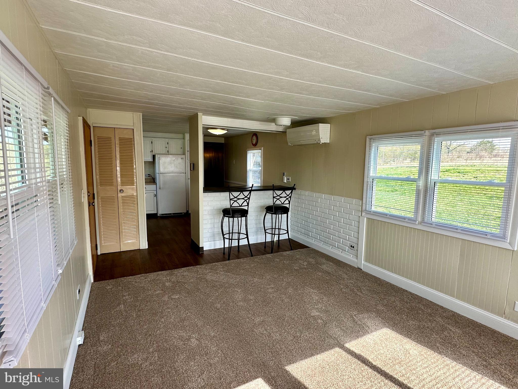 11449 A Alton Road Frederick, MD 21701 - Photo 7 of 25 a view of a kitchen with a sink and a refrigerator