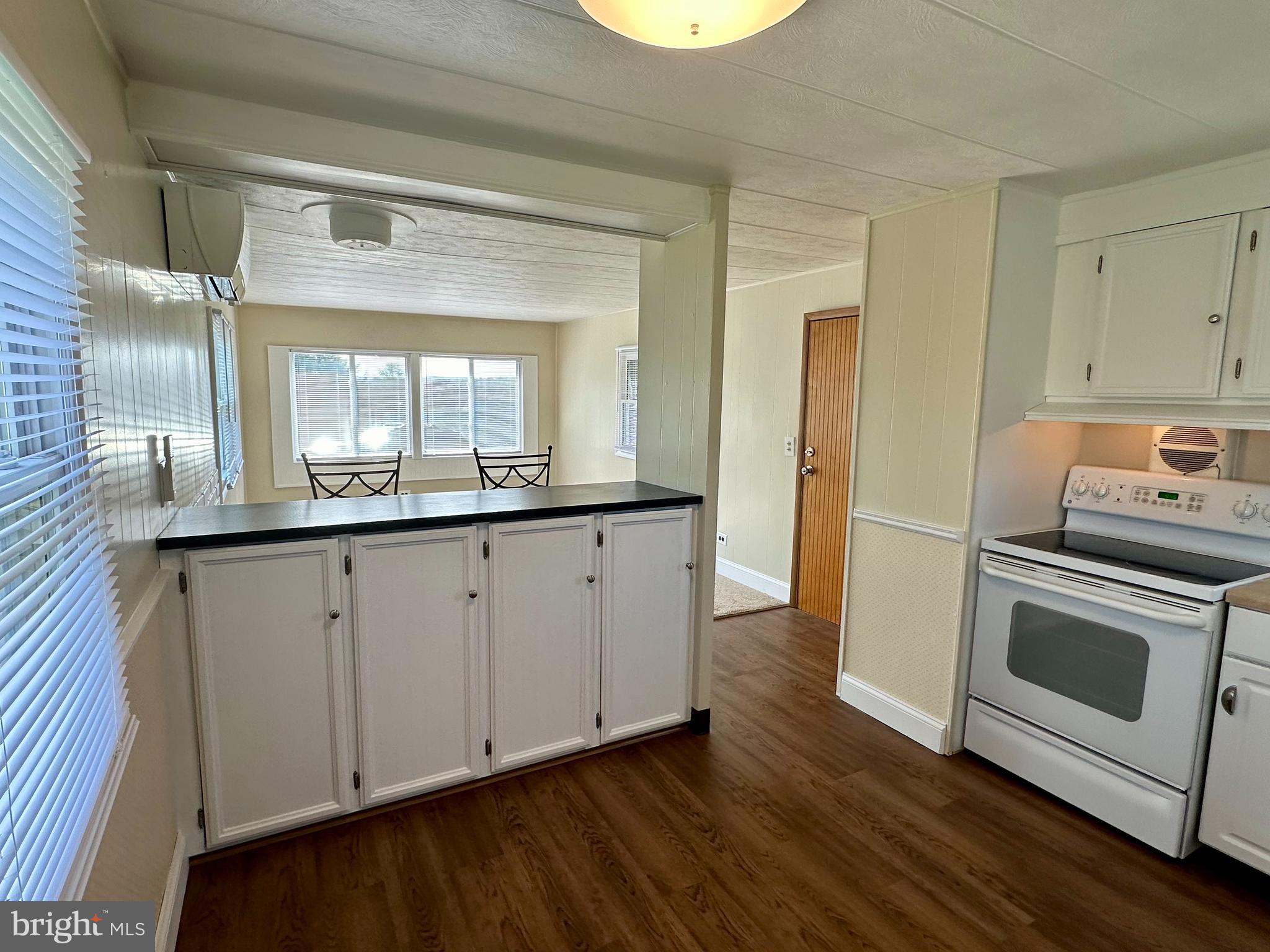 11449 A Alton Road Frederick, MD 21701 - Photo 8 of 25 a kitchen with a sink and a stove top oven