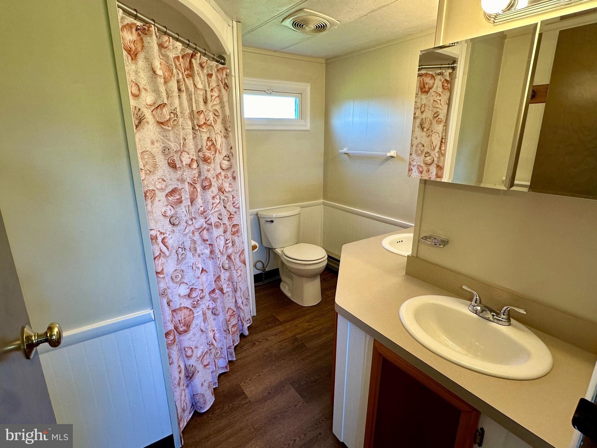 11449 A Alton Road Frederick, MD 21701 - Photo 10 of 25 a bathroom with a sink toilet and shower