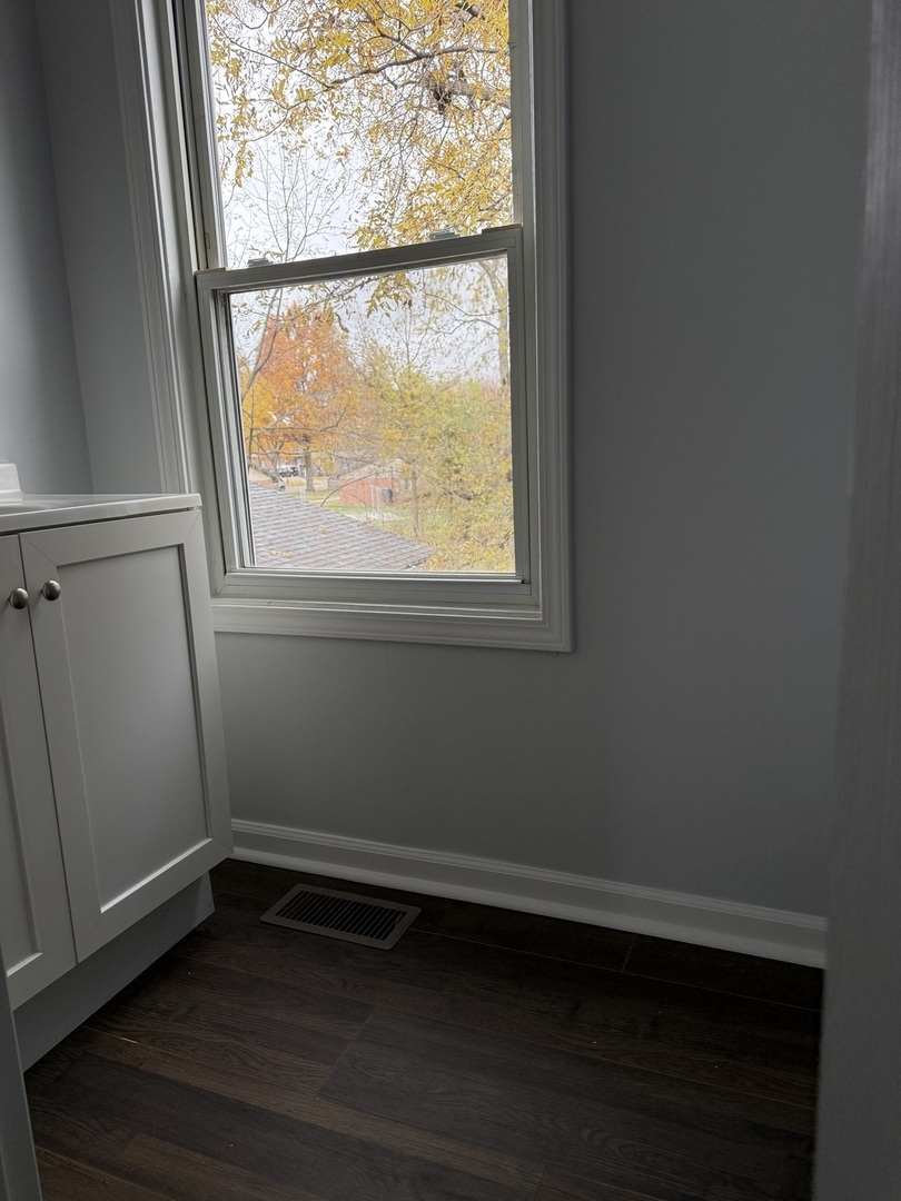 102 8th Avenue Mendota, IL 61342 - Photo 3 of 12 a view of an empty room with a window
