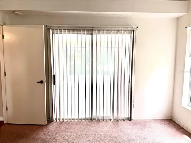 a view of cabinet with mirror