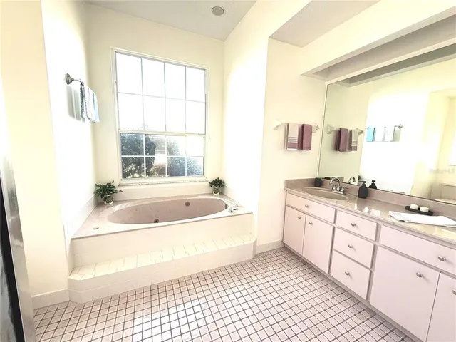 a view of a house with a yard and plants