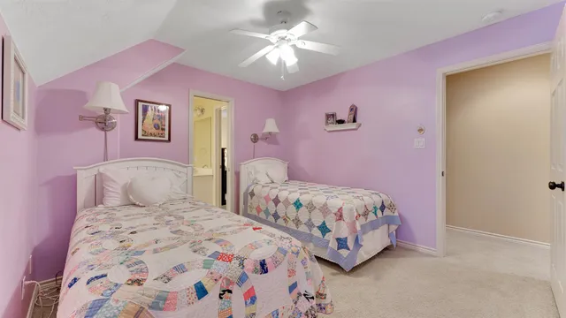 a view of a patio with a table chairs and a backyard