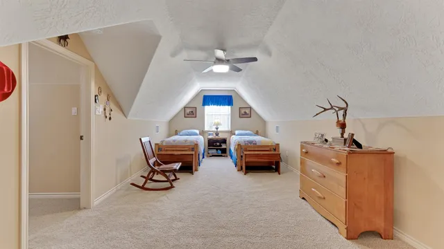 a view of house with a swimming pool