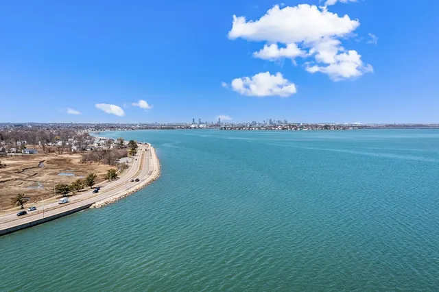 a view of a lake in middle of the house
