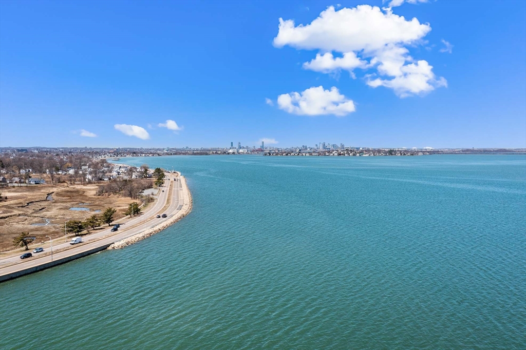 20-22 Sumner Street, Unit 202 Quincy, MA 02169 - Photo 15 of 15 a view of a lake in middle of the house