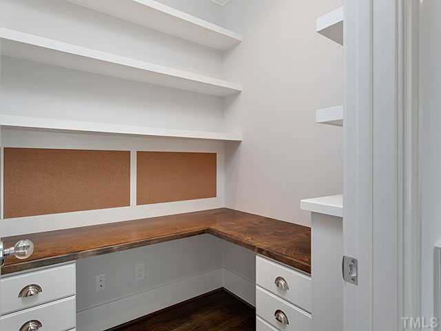 2012 Vinnings Place Raleigh, NC 27608 - Photo 8 of 25 a hallway with washer and dryer