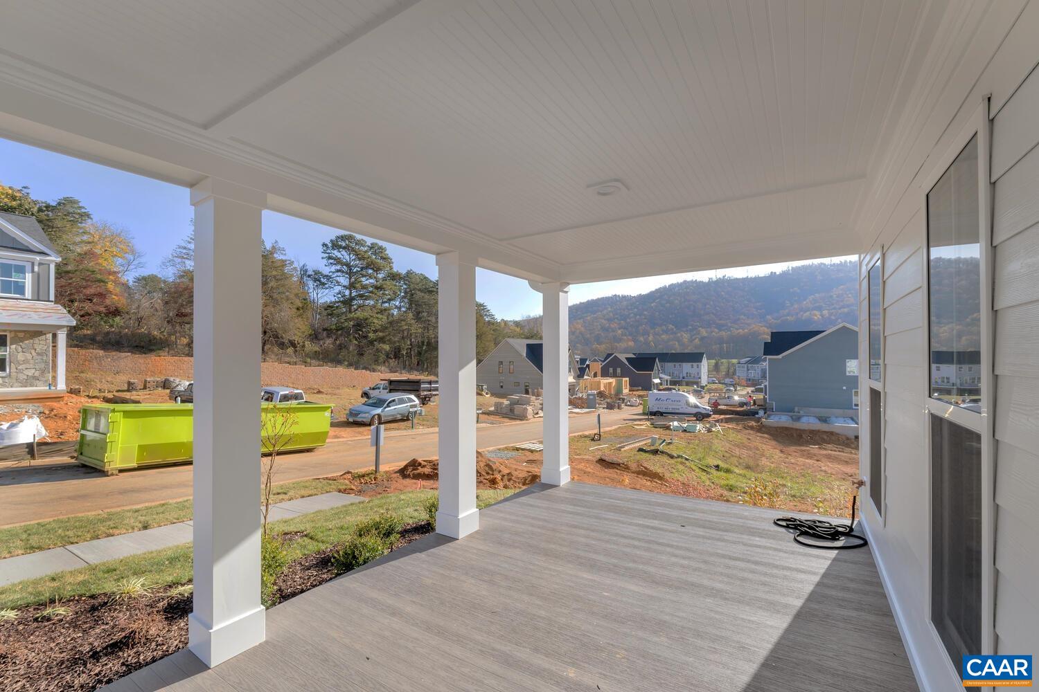 1150 Riparian Court Charlottesville, VA 22911 - Photo 4 of 67 a view of a living room and floor to ceiling window or kitchen