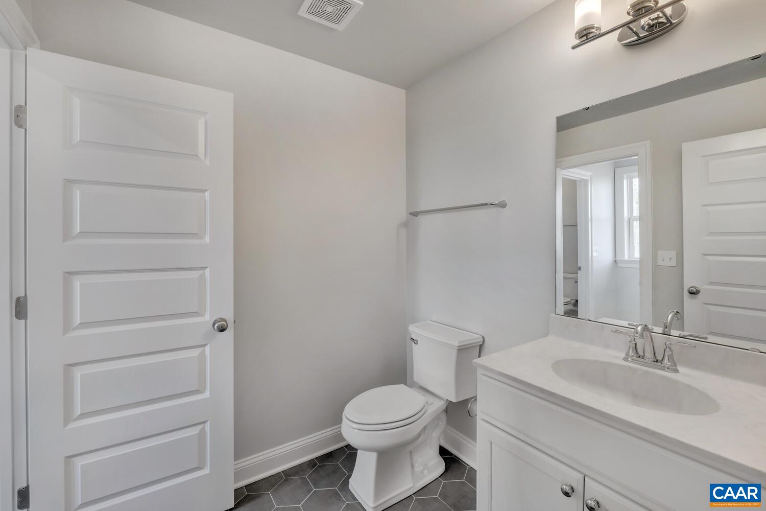 1150 Riparian Court Charlottesville, VA 22911 - Photo 47 of 67 a bathroom with a sink toilet and vanity
