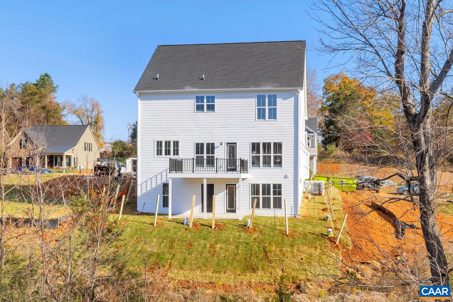 1150 Riparian Court Charlottesville, VA 22911 - Photo 56 of 67 front view of a house with a yard