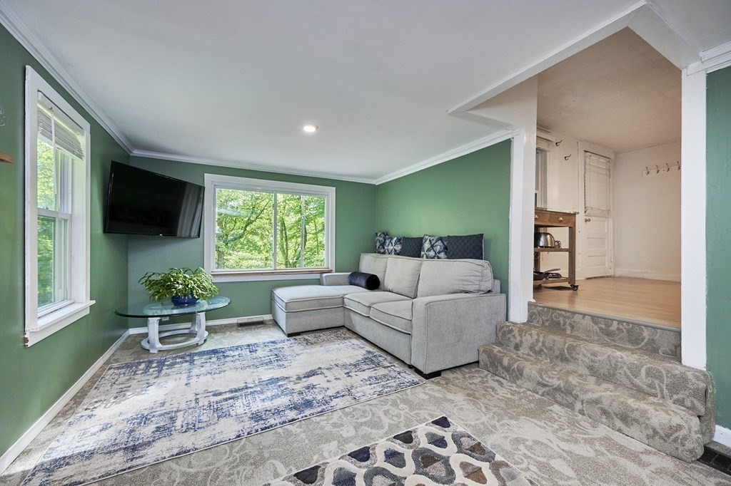 19 Spruce Corner Road Goshen, MA 01032 - Photo 14 of 41 a living room with furniture and a large window