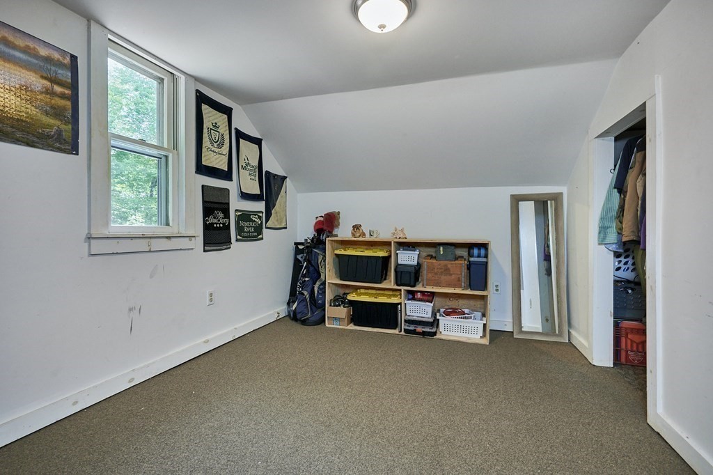 19 Spruce Corner Road Goshen, MA 01032 - Photo 27 of 41 a living room with furniture and a window