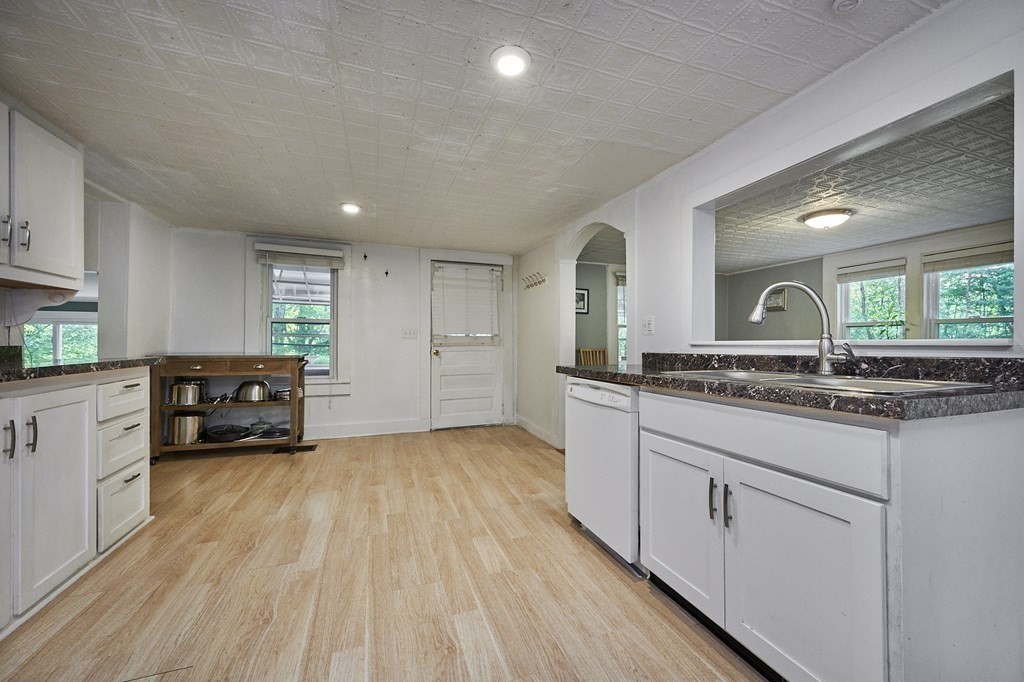 19 Spruce Corner Road Goshen, MA 01032 - Photo 8 of 41 a kitchen with counter top space sink and wooden floor
