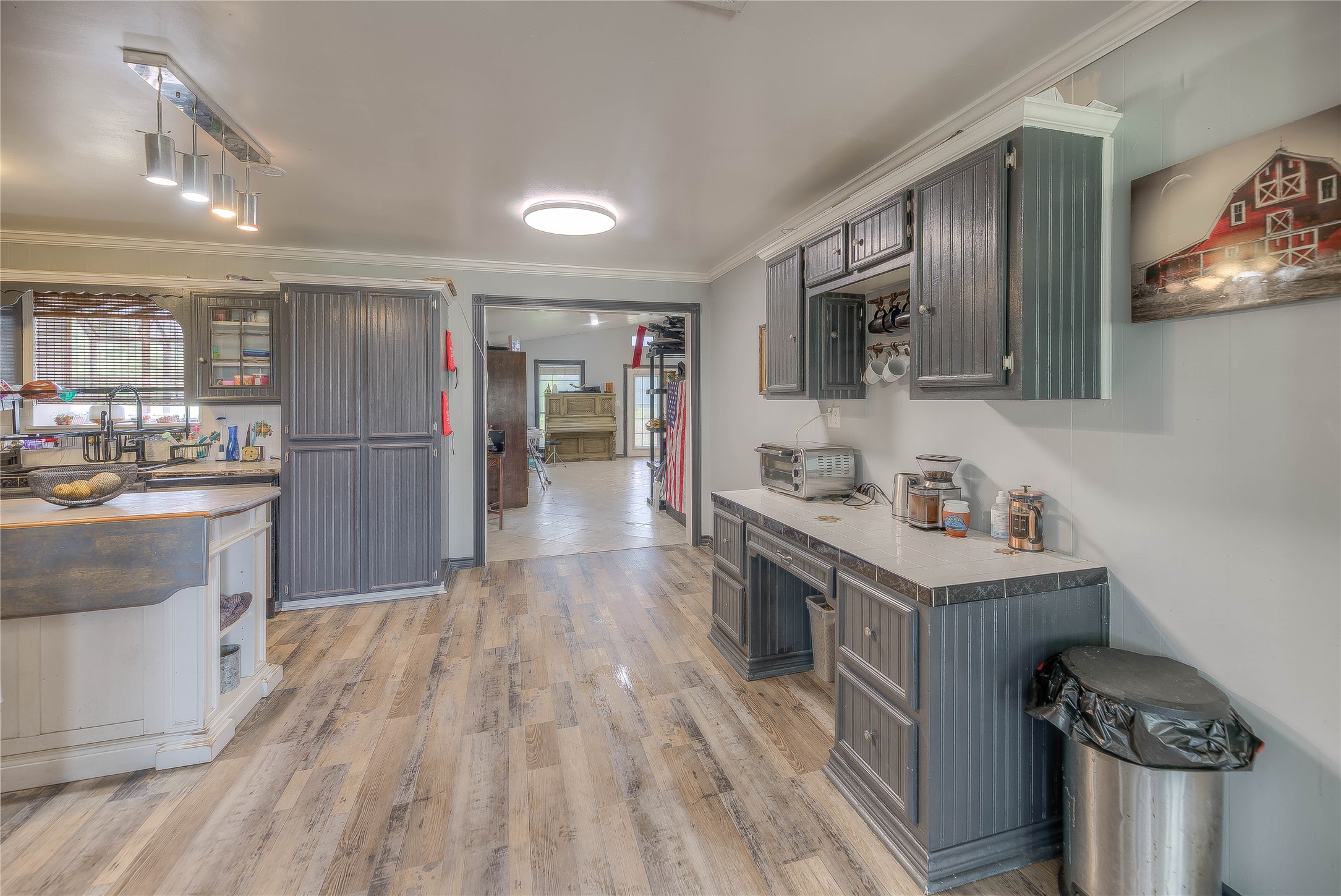 6982 Highway 94 Trinity, TX 75862 - Photo 10 of 33 a kitchen with a sink cabinets and stainless steel appliances