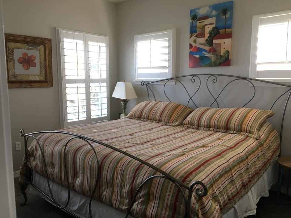76 Hidden Lake Way Santa Rosa Beach, FL 32459 - Photo 8 of 13 a bedroom with a bed and window